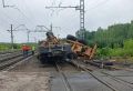 Поезд столкнулся с грузовиком, перевозившим трактор